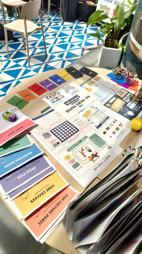 No-News Paper games and cards spread across a table ready to play